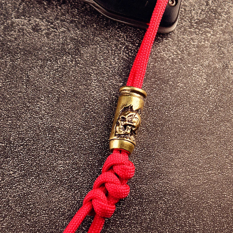 Luxe SkullCross™ Brass Bead | Fidget Jewelry & EDC Knife Paracord Accessory